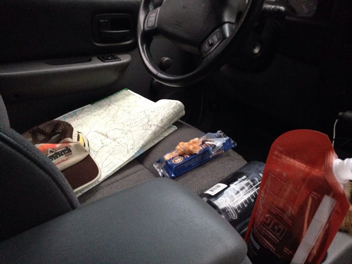 Wine, cheese, map party in the Jeep, woohoo! This is what happens when spooning with a wet, muddy 85-lb dog inside your brand new tent isn't on the top of your to-do list.
