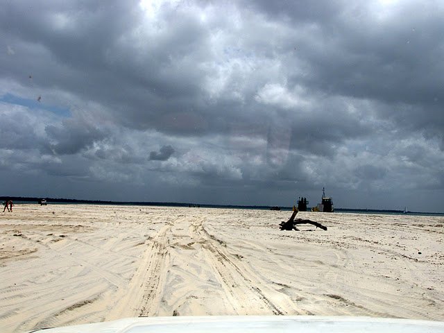 Driving across Rainbow Beach on our way to the Fraser Island barge