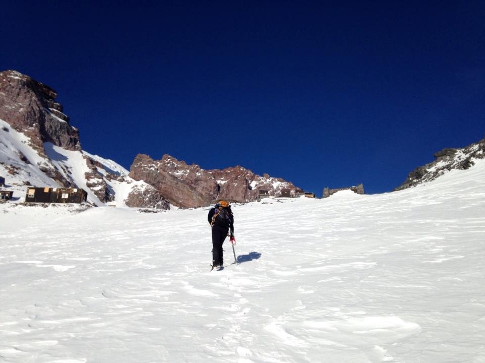 Catching a glimpse of Camp Muir over the ridgeline. Still a ways to go!